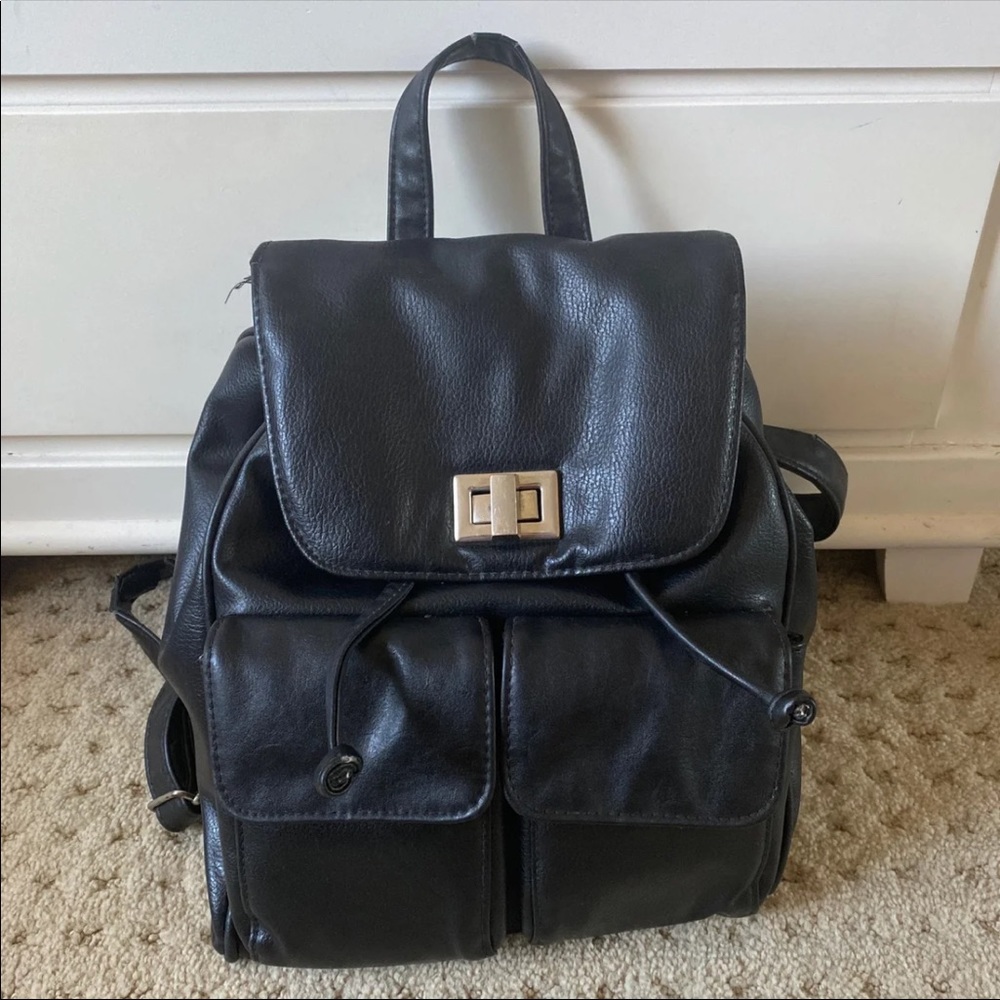 vintage black leather backpack